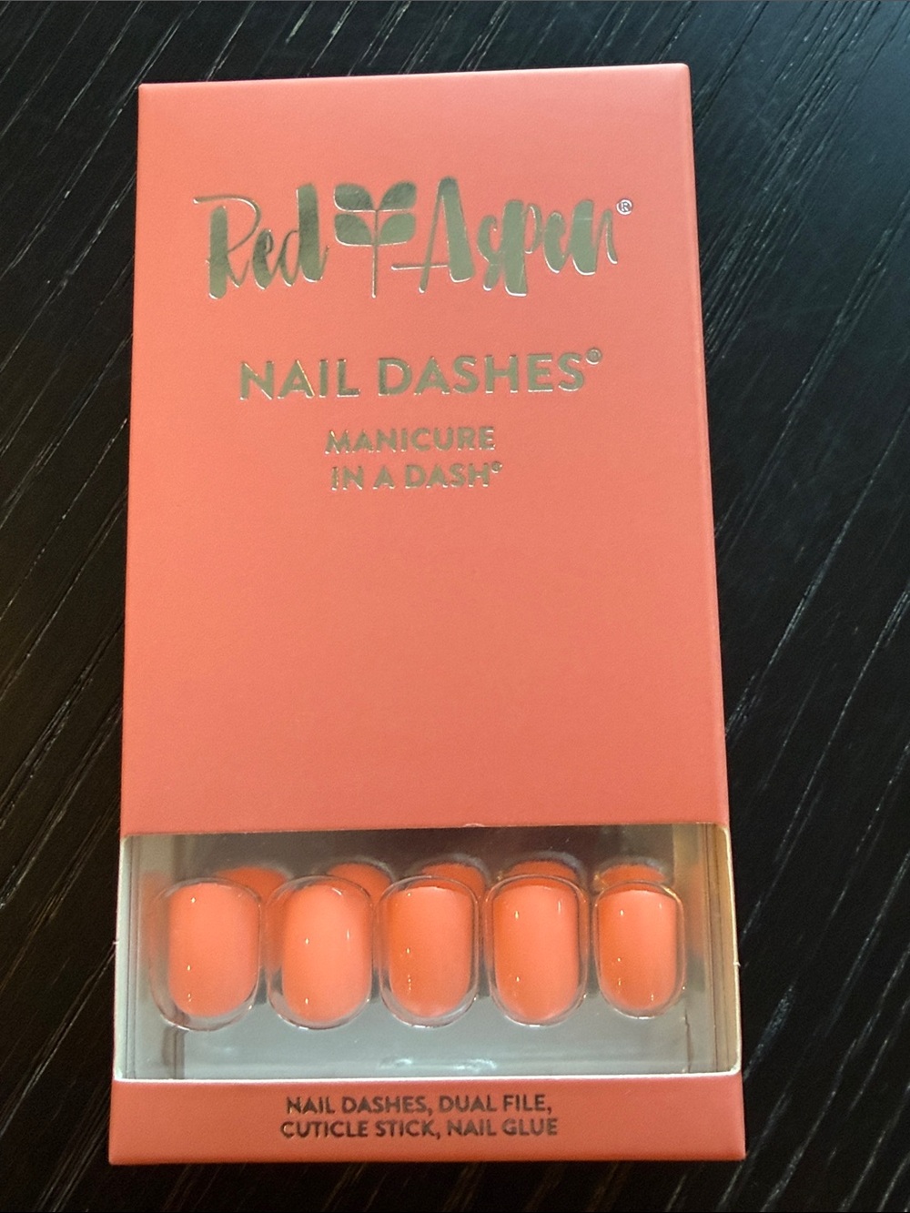 Red Aspen Nail Dashes Press-On Nails in color Kaitlyn’s Living Coral.